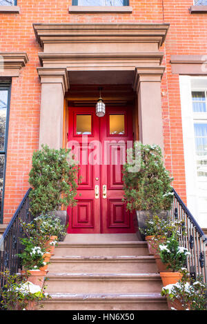 Typical Entrance door to a New York City apartment building residential home Stock Photo