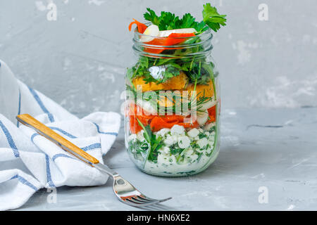 Healthy take-away lunch jar with salmon, cottage cheese, croutons. Love for a healthy vegan food concept Stock Photo