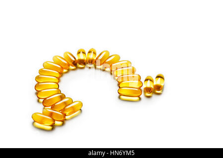 Omega-3 capsules - letter shape, isolated on white background. High resolution product. Health care concept Stock Photo