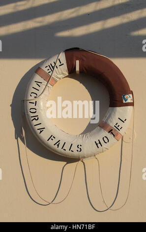 Lifesaver at the swimming pool of the iconic Victoria Falls Hotel Stock Photo