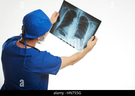 doctor checking x-ray image  of lungs in white laboratory Stock Photo