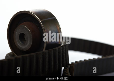 one roller on timing belt isolated on white Stock Photo