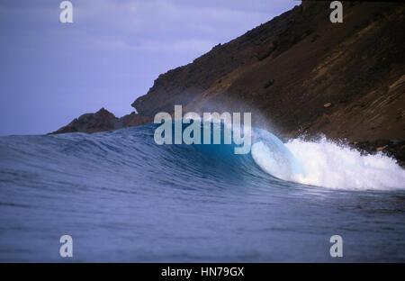 Blue tubing wave at Lobos Island in the Canary Islands. Stock Photo