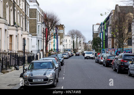 LONDON CITY - DECEMBER 25, 2016: Lancaster Road with typical freshly colored house facades near Portobello Road in Notting Hill Stock Photo