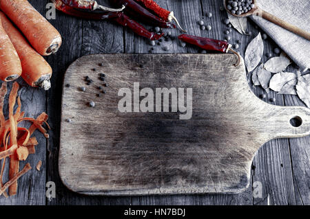 Brown cutting board for cutting food, top view, vintage toning Stock Photo