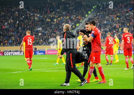 November 12, 2016: Robert Lewandowski #9 of Poland National Team immediately after a petard exploded near him  during the  World Cup qualifying campaign 2018 game between Romania and Poland at National Arena Stadium, Bucharest,  Romania ROU. Foto: Cristian Stavri/ SportAction.ro |Copyright: CronosFoto/Cristian Stavri| Stock Photo