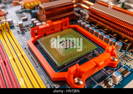 Cpu processor socket on a computer motherboard with pins visible Stock Photo