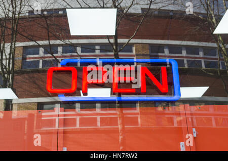 Red neon sign saying "open" Stock Photo