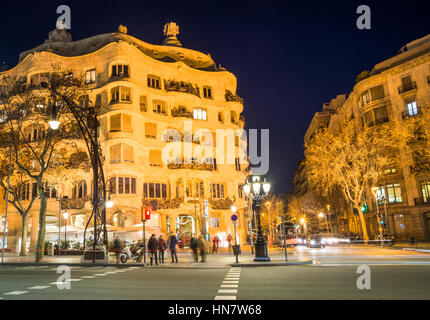 Gaudi's Casa Mila aka La Pedrera after dark, in Barcelona, Spain Stock Photo