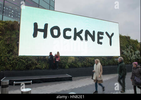 Westfield, London, UK. 9th Feb, 2017. On the day Tate Britain's David Hockney exhibition opens to the public, Tate will show the European premiere of Untitled, 382, an iPad painting depicting Hockney's Los Angeles garden, on its largest ever digital canvas. - a huge screen more than 50m square outside Westfield in Shepherd's Bush. Credit: Malcolm Park editorial/Alamy Live News Stock Photo