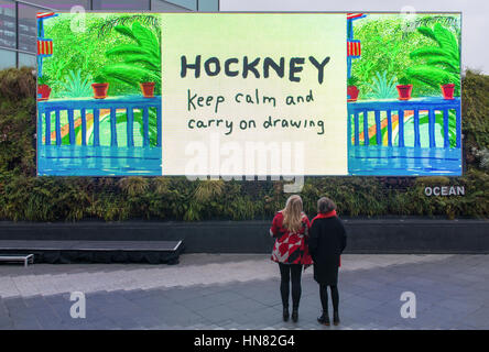 Westfield, London, UK. 9th Feb, 2017. On the day Tate Britain's David Hockney exhibition opens to the public, Tate will show the European premiere of Untitled, 382, an iPad painting depicting Hockney's Los Angeles garden, on its largest ever digital canvas. - a huge screen more than 50m square outside Westfield in Shepherd's Bush. Credit: Malcolm Park editorial/Alamy Live News Stock Photo