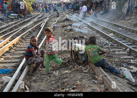 Dhaka, Bangladesh. 8th February 2017. A group of Bangladeshi slum children are playing in the railway track at Karwan Bazar in Dhaka, Bangladesh. On February 08, 2017 Credit: Mamunur Rashid/Alamy Live News Stock Photo