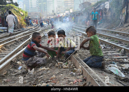 Dhaka, Bangladesh. 8th February 2017. A group of Bangladeshi slum children are playing in the railway track at Karwan Bazar in Dhaka, Bangladesh. On February 08, 2017 Credit: Mamunur Rashid/Alamy Live News Stock Photo