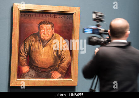 Duesseldorf, Germany. 09th Feb, 2017. A visitor looks at an artwork entitled 'Bildnis des Schauspielers Heinrich George' (lit. Portrait of the actor Heinrich George) by artist Otto Dix from 1932, in Duesseldorf, Germany, 09 February 2017. The artist's formative years in the lively art scene of the region are the focal point of a large-scale exhibition entitled 'Otto Dix. The Evil Eye, ' which will run from 11 February until 14 May 2017 at the North Rhine-Westphalian Art Collection. Photo: Federico Gambarini/dpa/Alamy Live News Stock Photo