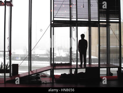 New York, USA. 09th Feb, 2017. An artist during a performance piece in the Whitney Museum in New York, USA, 09 February 2017. The artists plan on spending ten days in a small space enclosed with glass walls. Photo: Johannes Schmitt-Tegge/dpa/Alamy Live News Stock Photo