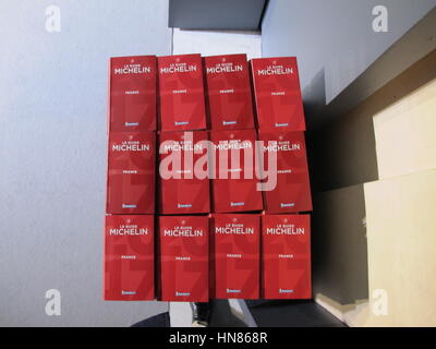 Paris, France. 09th Feb, 2017. Numerous copies of the famous Le Guide Michelin are stacked on a table during a presentation of the new gastronomic guide in Paris, France, 09 February 2017. Photo: Christian Böhmer/dpa/Alamy Live News Stock Photo