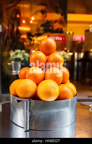 pyramid of oranges, beautiful and mature put on display Stock Photo