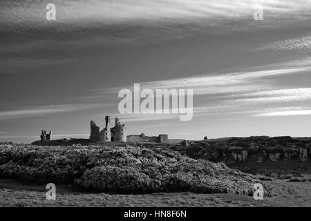 Summer skies, Dunstanburgh Castle, North Northumbrian Coast, Northumbria County, England, UK