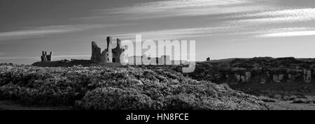 Summer skies, Dunstanburgh Castle, North Northumbrian Coast, Northumbria County, England, UK