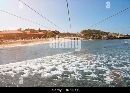 zip line adventure in caribbean under sea water Stock Photo