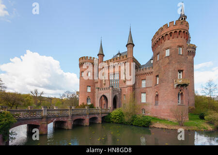 Bedburg-Hau, Germany - April 17, 2016: South-eastern view of Moyland castle in the district of Kleve, one of the most important neo-Gothic buildings i Stock Photo