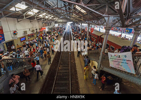 Colombo, Sri Lanka, March 21 2016: crowds of people on railway station in Colombo, capital of Sri Lanka. Train is one of most popular mean of transpor Stock Photo