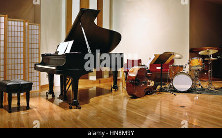 Save  Download Preview     Grand piano, double bass and drams on stage ready for concert Stock Photo