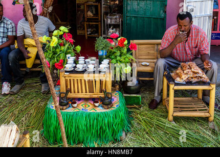 Ethiopian People Drinking Coffee At An Outdoor Cafe (Coffee Ceremony), Lake Ziway, Ziway, Ethiopia Stock Photo