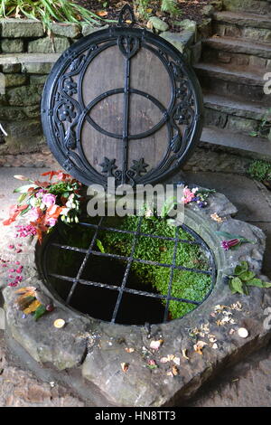 Sacred Well in the Chalice Well Gardens, Glastonbury, Somerset, Avalon, UK Stock Photo