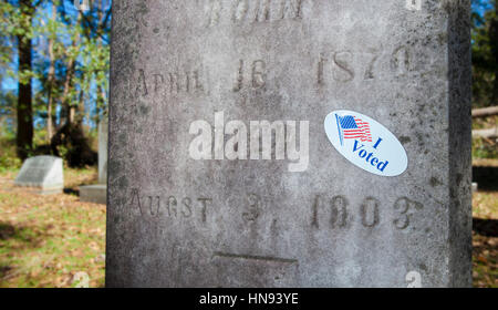 Sticker on a grave marker that indicates the person voted Stock Photo