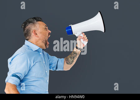Man Holding Megaphone Studio Concept Stock Photo