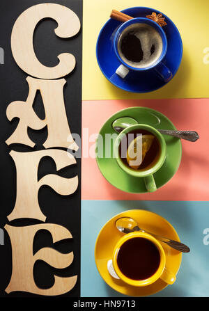 cup of coffee, tea and cacao at colorful background Stock Photo