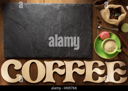 cup of coffee and letters on wooden background Stock Photo