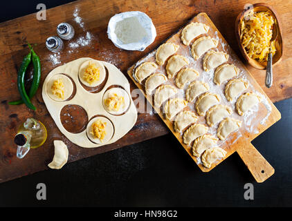 Vareniki with cabbage ( dumplings ) , pierogi before boiling - traditional Ukrainian food Stock Photo