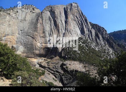 During Yosemite National Park's dry season, no water flows over Upper Yosemite Fall. Photographed from the Upper Yosemite Fall Trail. Stock Photo