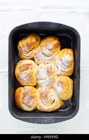 cinnamon roll on a baking sheet Stock Photo