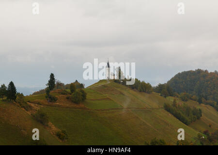 Jamnik church on a hillside in autumn at sunset in Slovenia, Europe Stock Photo