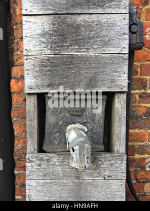 Village pump outside the Market Hall in Old Amersham, Buckinghamshire, England, UK. The lead tank carries the date '1785'. Stock Photo