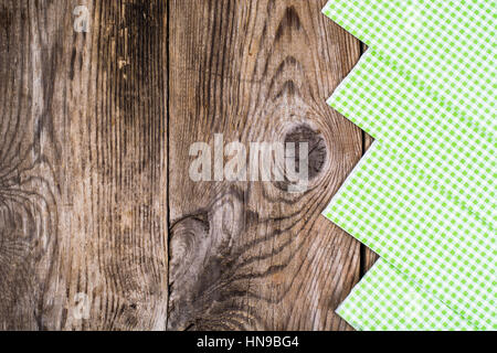 Disposable paper napkins on background of old boards Stock Photo