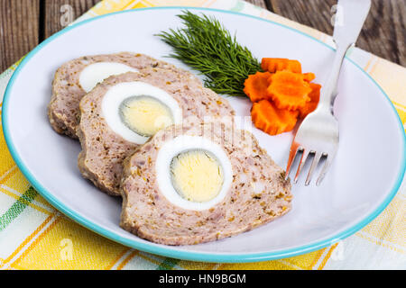 Meatloaf with boiled egg Stock Photo