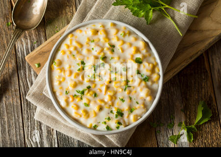 Fresh Homemade Creamed Corn in a Bowl Stock Photo