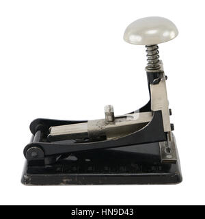 Old-fashioned black metal stapler, isolated on white. Stock Photo
