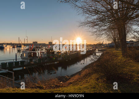 View across the small fishing habor of Strande community with its fishing boats,  Baltic Sea, Schleswig Holstein, Germany Stock Photo