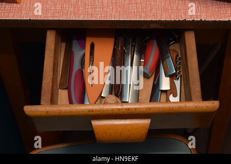 Sharp knives in a drawer Stock Photo