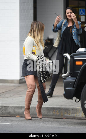 Hilary Duff struts her stuff in a denim skirt and knee high boots while out for lunch with a friend at Joan's on Third in Studio City  Featuring: Hilary Duff Where: Los Angeles, California, United States When: 09 Jan 2017 Credit: WENN.com Stock Photo