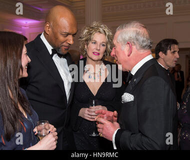 The Prince of Wales speaks to Colin Salmon as he attends the annual Prince's Trust 'Invest In Futures' reception at The Savoy Hotel in London, where he met the charity's ambassadors, supporters and beneficiaries. Stock Photo