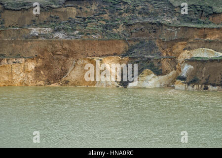 Artificial lake created by sinking old quartz sand mine Stock Photo