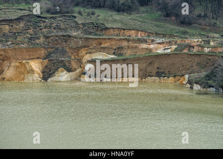 Artificial lake created by sinking old quartz sand mine Stock Photo