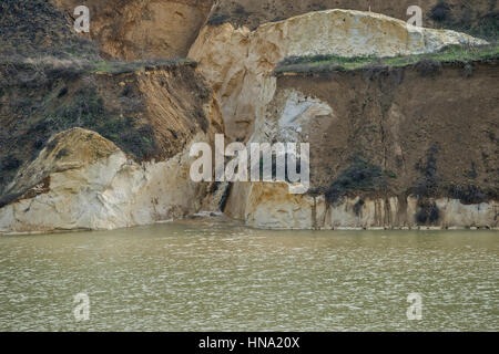 Artificial lake created by sinking old quartz sand mine Stock Photo