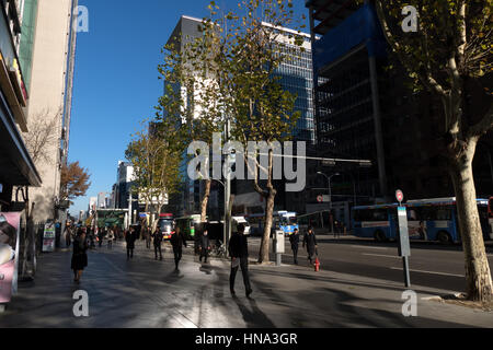 View of Gangnam-daero Avenue in Gangnam district, Seoul, South Korea, Asia. Traffic, cars, buses, people walking, commuters, rush hour in the morning Stock Photo